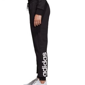 Adidas Essentials black Linear joggers w logo | women’s medium